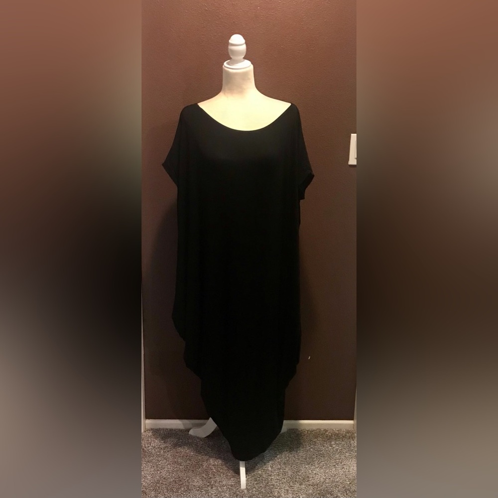 Black roomy caftan, can be worn off shoulder or on. Resort/ leisure elegance!